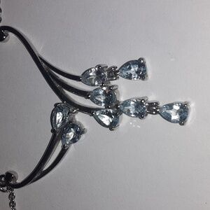 Sky blue topaz necklace in stainless steel.   Magnetic clasp.